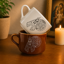 Xícara Nossa Senhora Aparecida e Medalha de São Bento em Porcelana®